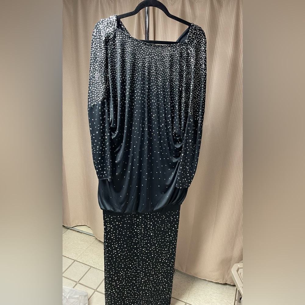 black gown with silver embellishments ..back has cowl n back slit